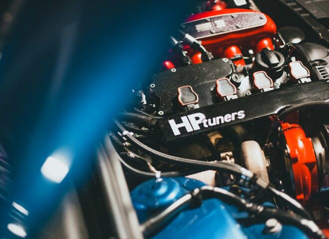 sh tuning - Dynamic close-up of a modern car engine featuring HP Tuners branding, showcasing automot